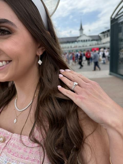 Kite-shaped mother of pearl earrings, engagement ring, and pendant with the iconic twin spires of Churchill Downs in the background