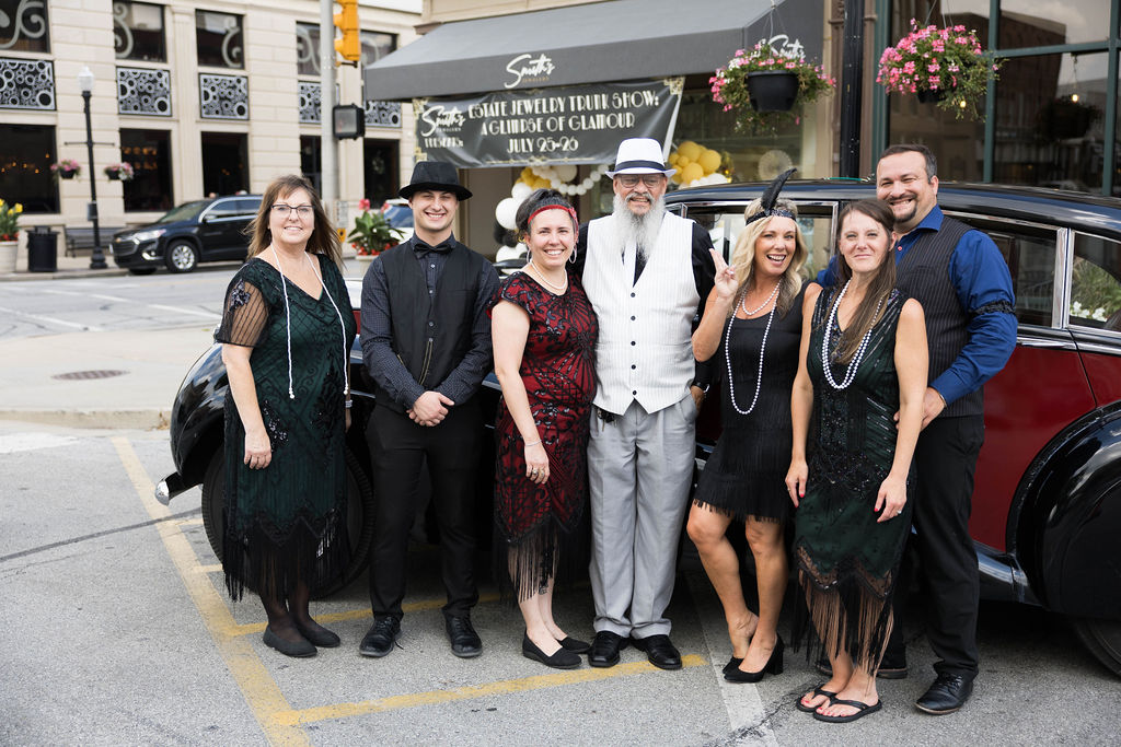 The Smith's team with a 1950s-era classic car